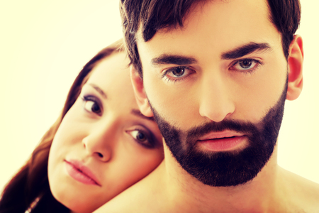 Beautiful woman with her head on man's back.の写真素材