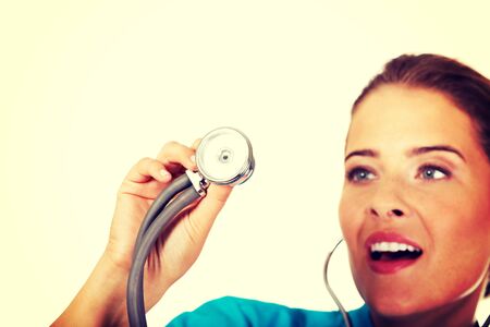 Young female doctor or nurse with stethocope.の写真素材
