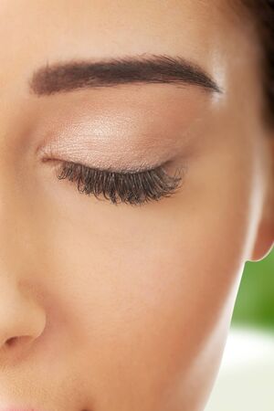 Beautiful woman with fresh makeup and eyes closed.の写真素材