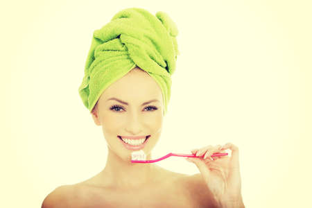 Beautiful caucasian woman with toothbrush.の写真素材