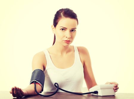 Woman doing blood pressure test