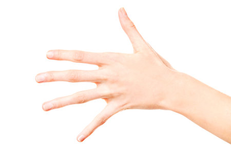 Woman hand showing five fingers isolated on a white background.