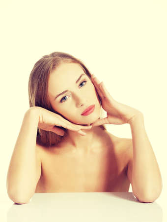 Portrait of beautiful topless caucasian woman. Spa concept. Isolated on white.の写真素材