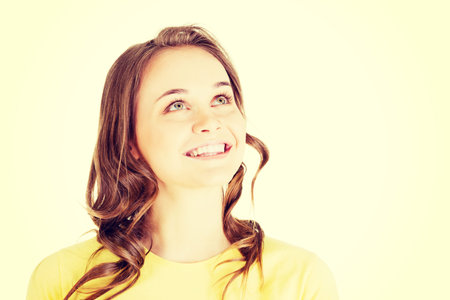 Young woman looking away, isolated on white