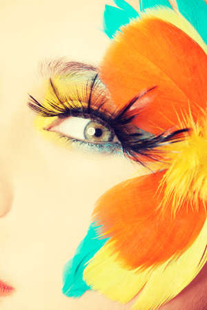 Beautiful woman with abstract artistic make up.の写真素材