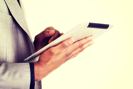 Handsome businessman with tablet computer