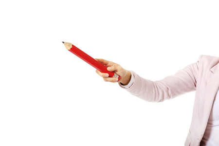 Business woman pointing for copyspace or something with huge pen.の写真素材