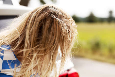 Young woman calling for help.の写真素材
