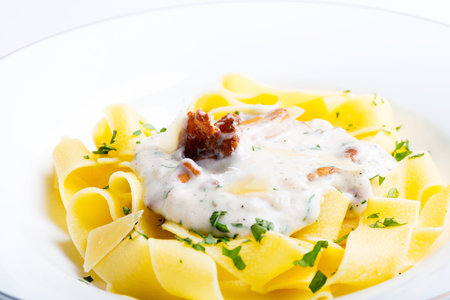 Pasta with cream sauce with chanterelle.の写真素材