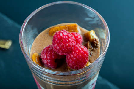 Glass of chocolate and rapsberry dessert.の写真素材