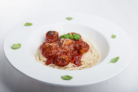 Pasta with meatballs and tomato sauce.の写真素材