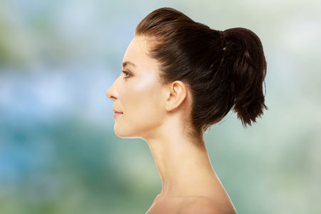 Beautiful thoughtful spa woman with make up.
