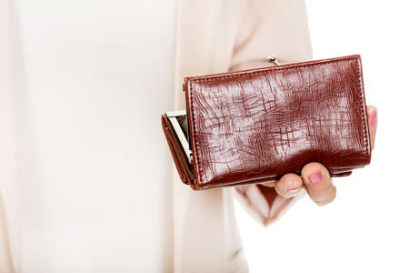 Worried elderly woman with empty wallet.の写真素材
