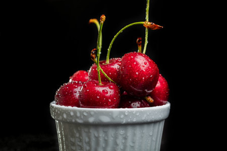 Heap of juicy wet cherries.の写真素材