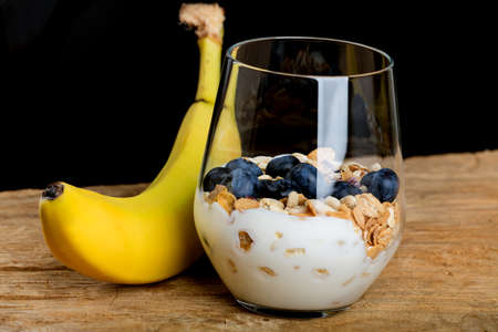 Dietetic breakfast - fruits yoghurt and muesli.の写真素材