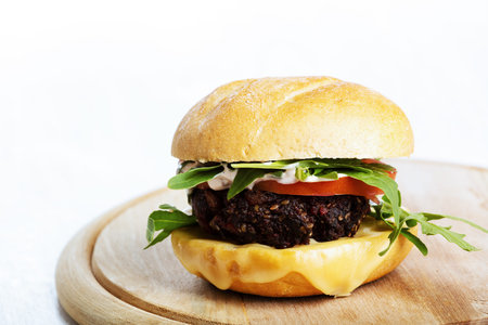 Vegetarian burger with cheese and vegetables.の写真素材