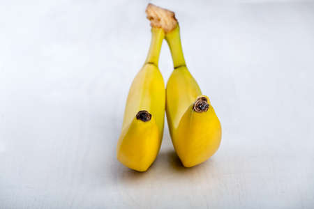 Two fresh ripe yellow bananas.の写真素材