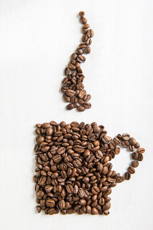 Coffee cup and steam made from coffee seeds.の写真素材