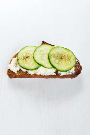 Single sandwich with cream cheese and cucumber.の写真素材