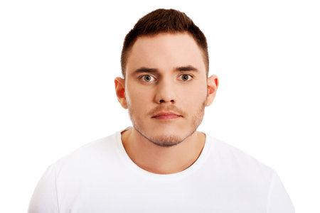 Portrait of young angry man.の写真素材