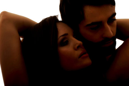 Sexy passionate heterosexual couple embracing.