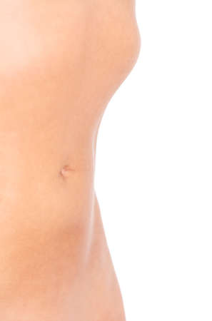 Slim nude young woman belly.の写真素材