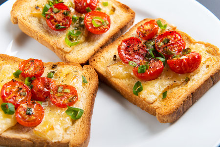 Grilled toast with camembert and cherry tomatoes