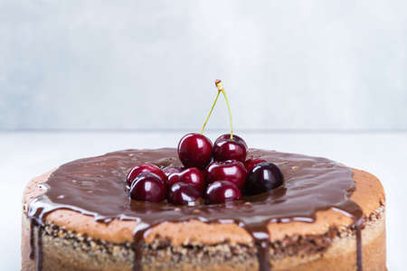 Chocolate cake with juicy cherriesの写真素材