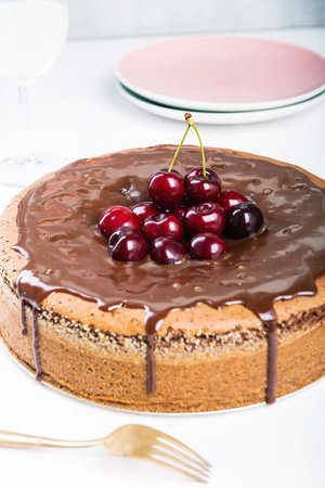 Chocolate cake with juicy cherries