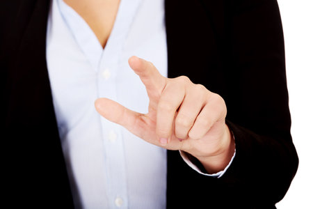 Business woman push virtual buttonの写真素材