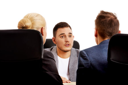 Business meeting-three people sitting and talking
