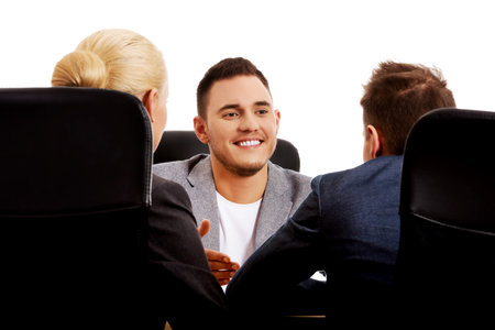 Business meeting-three people sitting and talking