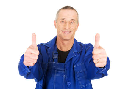 Repairman showing thumbs upの写真素材