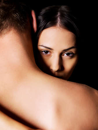 Beautiful nude couple in a tender embrace.の写真素材