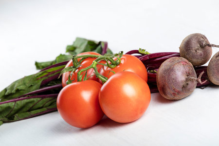 Raw fresh beetroot and tomatoes