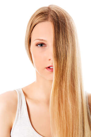 Blond hair. Beautiful woman with straight long hair.の写真素材