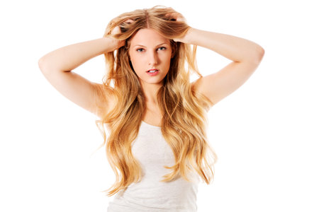 Beautiful young woman with gorgeous hairstyle.