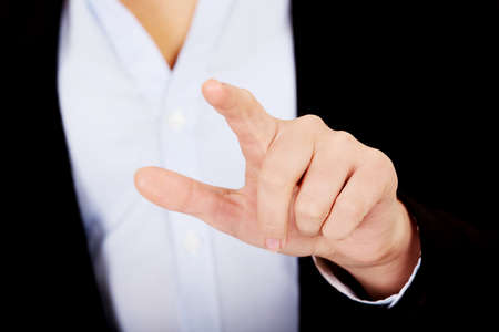 Business woman push virtual buttonの写真素材