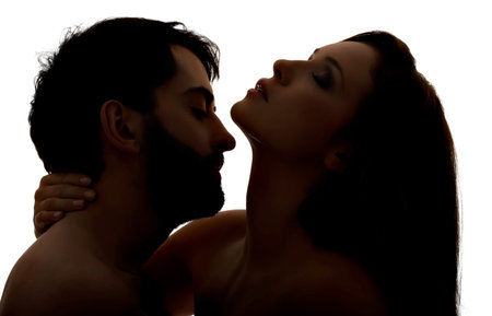 Caucasian man kissing womans neck.の写真素材