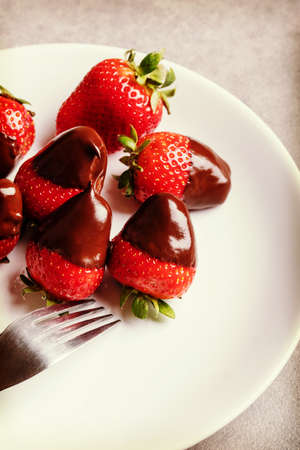 Juicy strawberry with milk chocolate.の写真素材