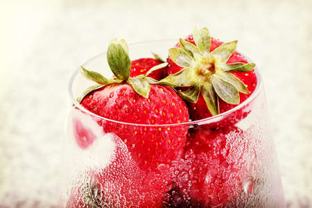 Frozen red strawberry in glass.の写真素材