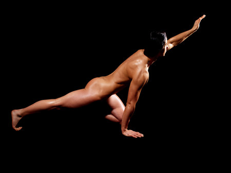 Muscular bodybuilder woman showing her muscles.の写真素材