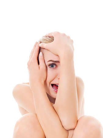 Beautiful nude woman sitting on florの写真素材