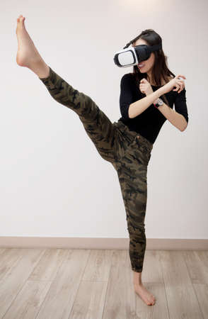 Happy woman wearing virtual reality gogglesの写真素材