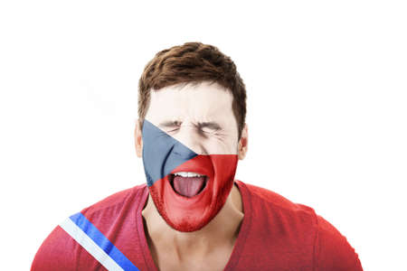 Screaming man with Czech Republic flag painted on face.の写真素材