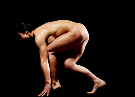 Muscular bodybuilder woman showing her muscles.の写真素材