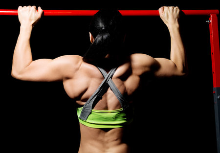 Women excercising on rod
