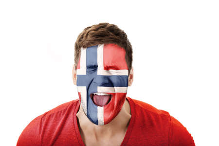 Screaming man with Norway flag on face.の写真素材