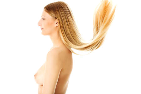 Beautiful long blonde hair, isolated on white.の写真素材