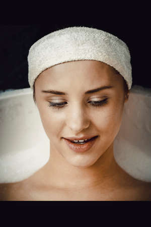 Bathing woman relaxing in bath.の写真素材